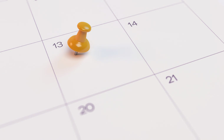 A calendar with a pin mark on the date 13th