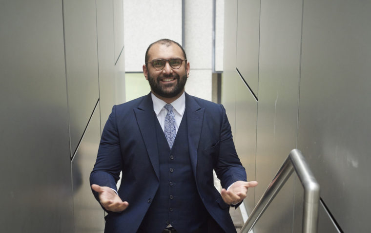 A picture of Bilal Mahmood standing on a staircase