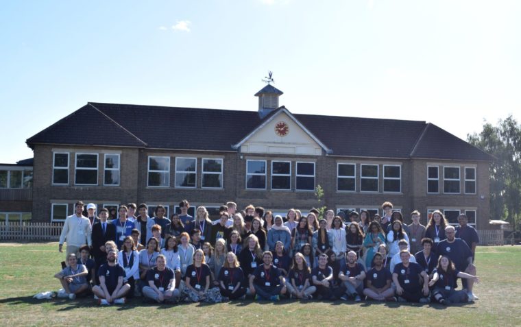 groups of students and mentors outside Debate Academy 2022 school. Excited to boost their debate skills